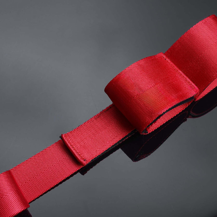 Bowknot Hogtie Portable Bondage Gear in bold red with decorative bow-knot, enhancing intimate experience.