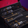 Luxury black leather bondage tools set with gold accents in an elegant case featuring a unique handle design.